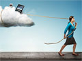 Woman followed by a cloud with personal electronics in it