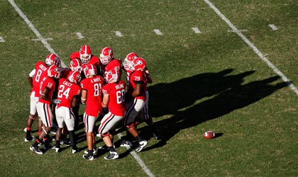 ATHENS, GA - OCTOBER 03: Quarterback Joe Cox #14 and the Georgia Bulldogs offense against the Louisiana State University Tigers at Sanford Stadium on October 3, 2009 in Athens, Georgia. (Photo by Kevin C. Cox/Getty Images)