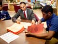 Rod Carter, left, has been mentoring students like Delante Desouza for more than 20 years, through the Maryland ReServe program.  