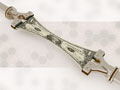 Robotic arms stretching US dollar bill