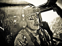 Chief Warrant Officer Walter R. Jones pilots a Black Hawk over the mountains of Afghanistan. Chief Warrant Officer Walter R. Jones pilots a Black Hawk over the mountains of Afghanistan.