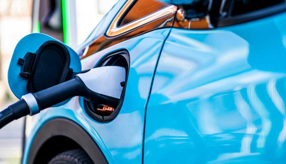 an electric car plugged into a charging cable