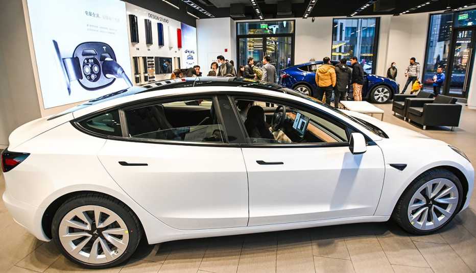  A Model 3 vehicle is seen at a Tesla flagship store on January 4, 2021 