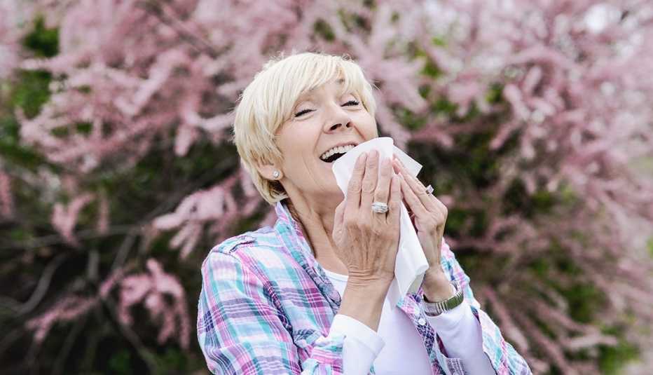 Woman sneezing