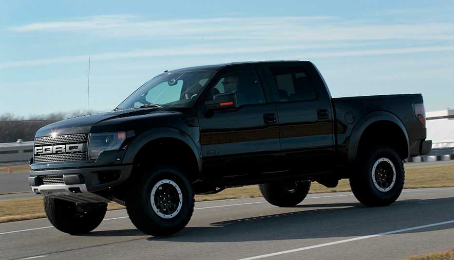 black Ford F-150 on open road