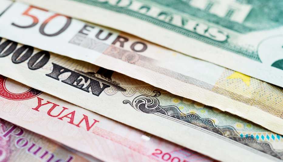 dollar, euro, yen, yuan, pound currency bills 