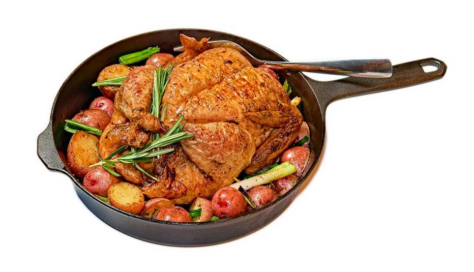 roast chicken, potatoes and spring opinions in a skillet