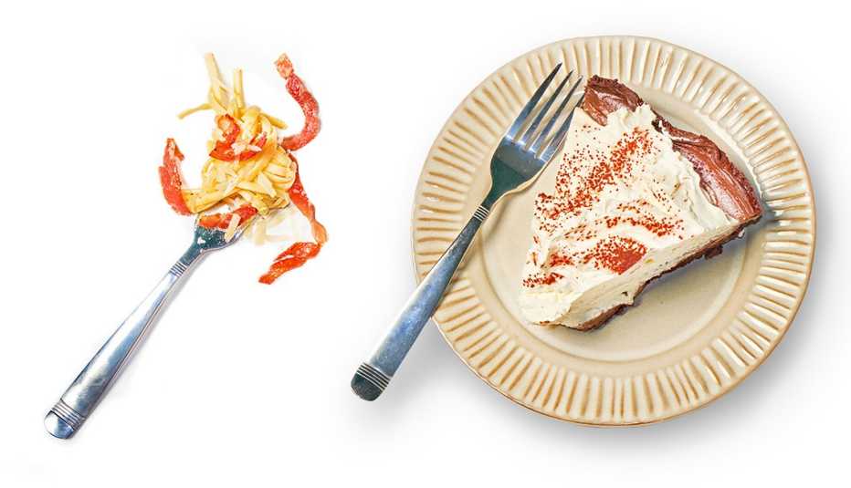 forkful of spaghetti carbonara beside a slice of chocolate cream pie with fork on a plate