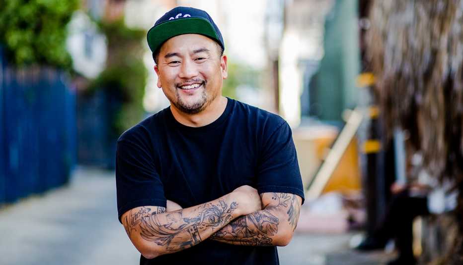 chef Roy Choi smiling with armed crossed
