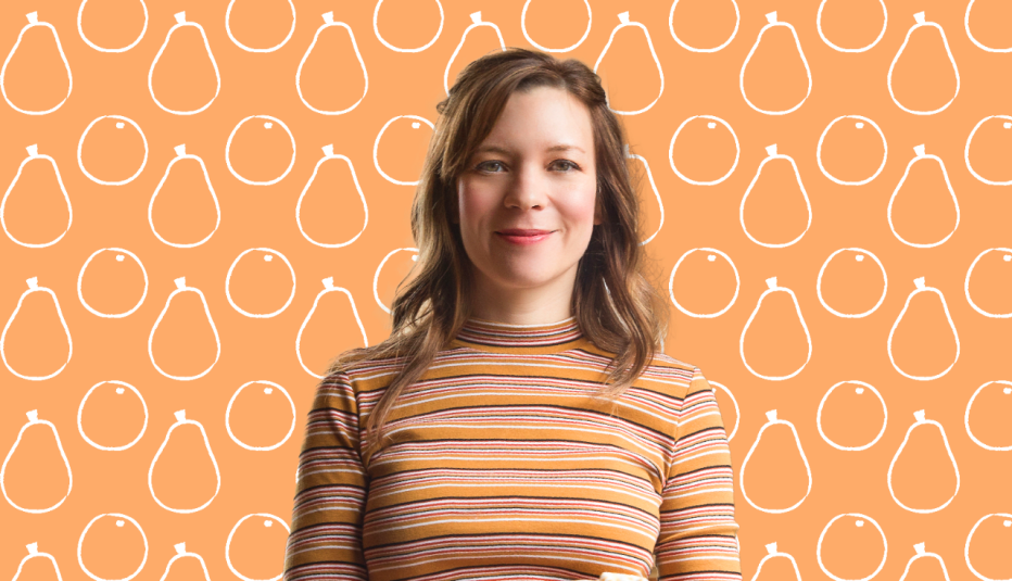 amy thielen in front of orange background with cutouts of pears and oranges