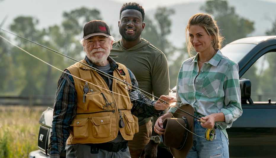 brian cox as ike fletcher, sinqua walls as colter and perry mattfield as lucy standing outside in still from mending the line