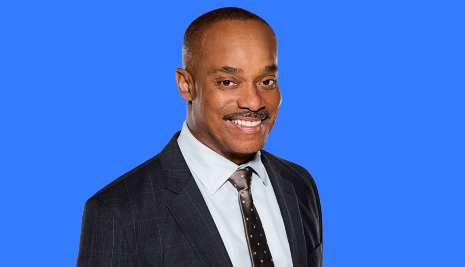 rocky carroll against blue background