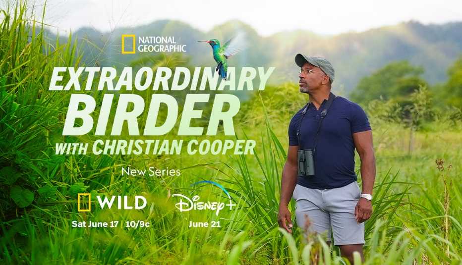 christian cooper standing amongst plants and shrubs; words extraordinary birder with christian cooper on his right