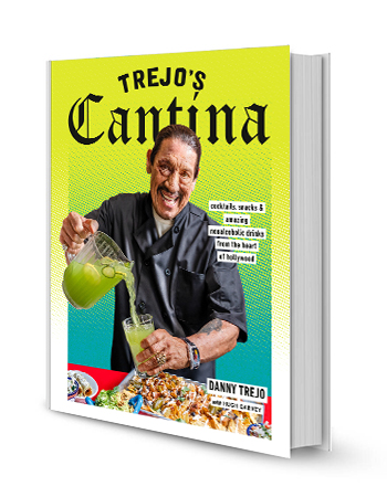 trejo's cantina book cover with danny trejo on it pouring drink from pitcher into glass; food on table in front of him