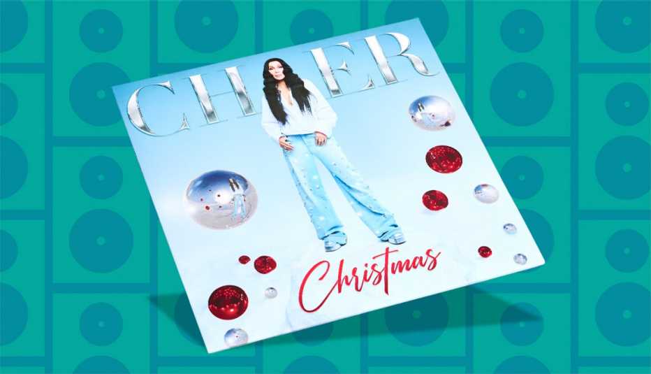 music album cover with picture of cher on it and words cher christmas
