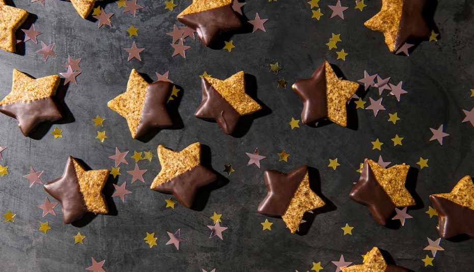 star-shaped cookies with half of each star dipped in chocolate