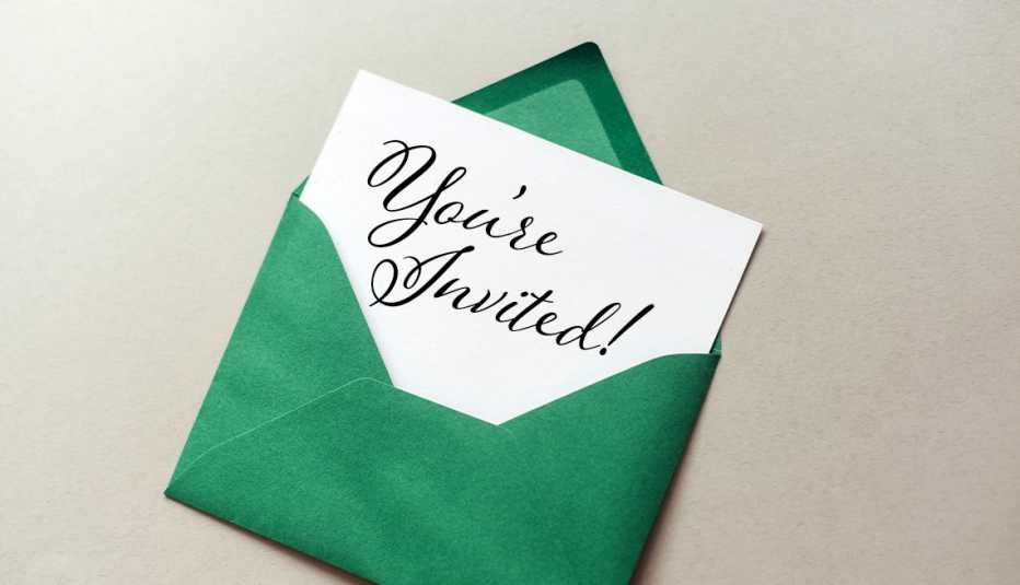invitation that says you're invited in a green envelope