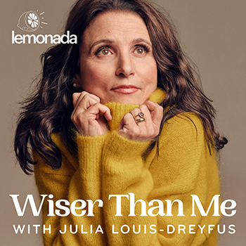 julia louis-dreyfus wearing yellow sweater, hands under chin, on cover of her podcast that says wiser than me