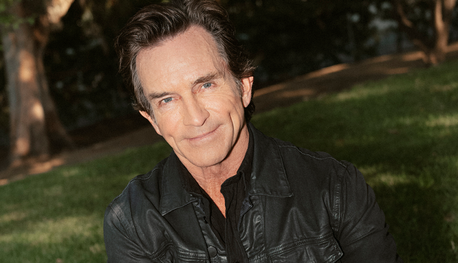 headshot of Jeff Probst with grassy hill behind him