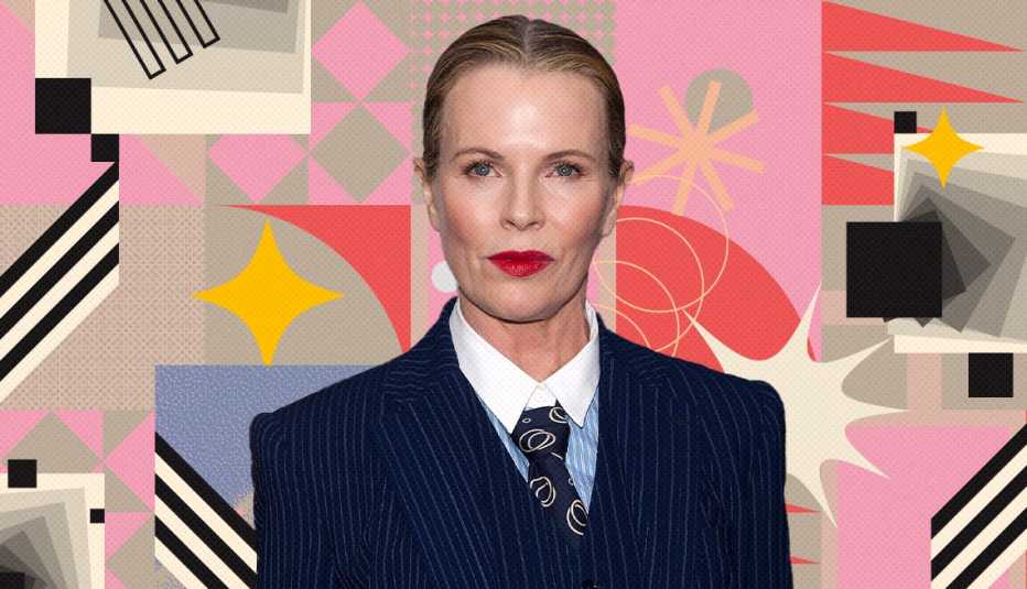 kim basinger on colorful, flashy background with all sorts of shapes and symbols