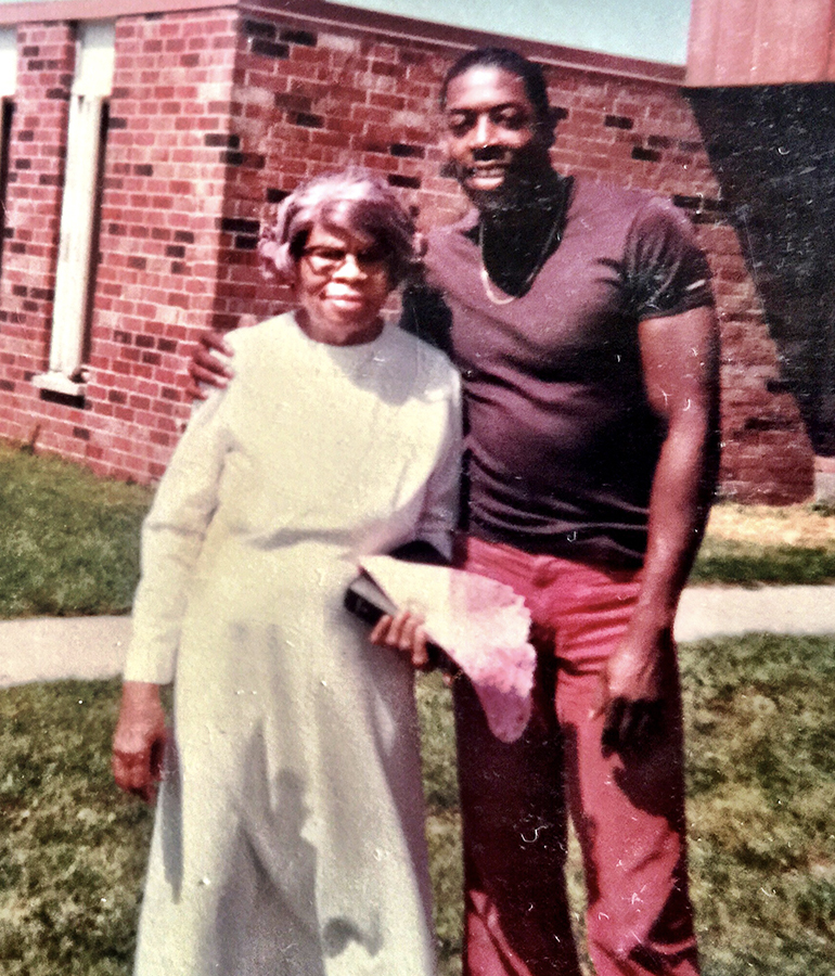 ernie hudson standing with his grandmother outside
