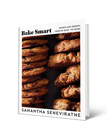 book cover with words bake smart, sweets and secrets from my oven to yours, by samantha seneviratne; picture of cookies
