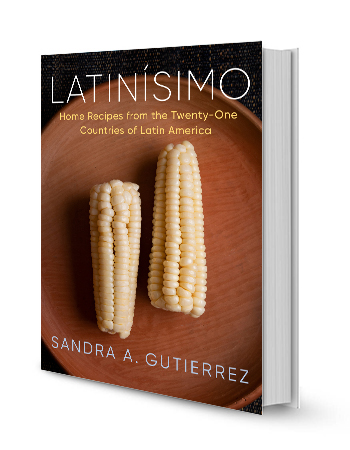 cover of latinísimo cookbook showing two ears of cooked corn