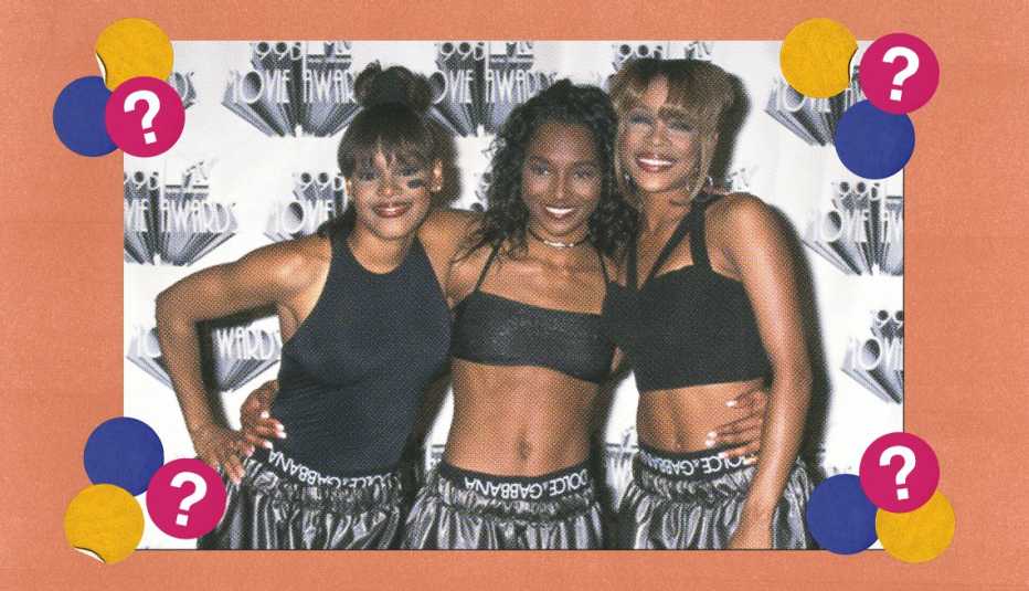 Lisa Left Eye Lopes, Chili, and T-Boz standing in front of M T V Movie Awards backdrop; surrounded by blue, yellow and pink circles with question marks in them