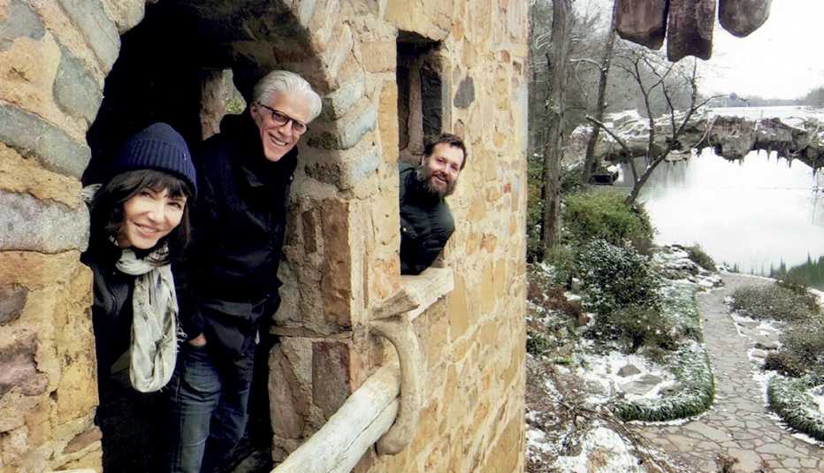 A smiling Mary Steenburgen, Ted Danson and Will Forte, peek out from the Old Mill in Little Rock, Arkansas