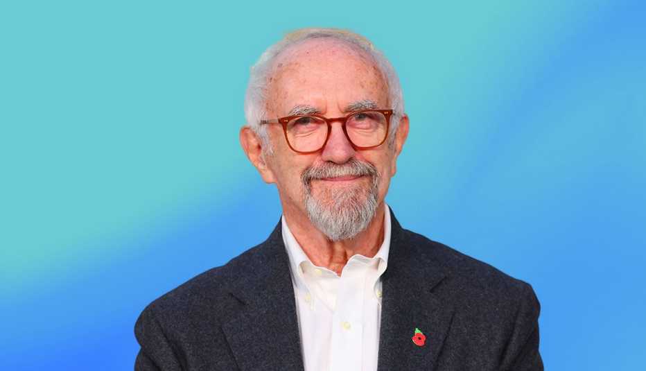 jonathan pryce on blue ombre background