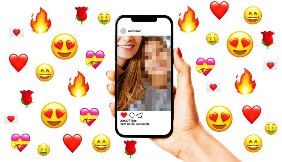 hand holding smartphone with Instagram photo on it, surrounded by reaction emojis including smiley faces, hearts, roses and fire