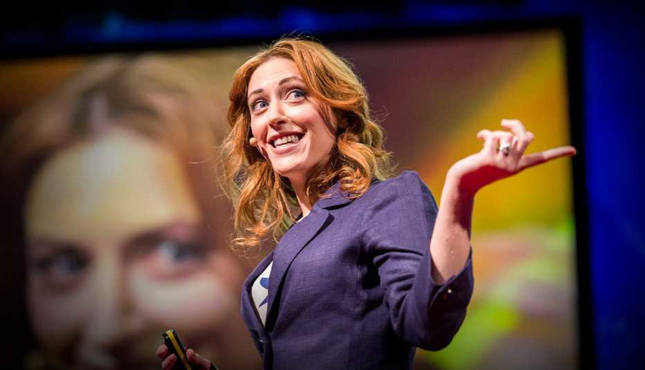kelly mcgonigal looking and pointing to the left