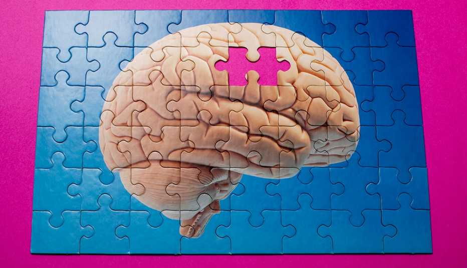 A jigsaw puzzle of a brain with one missing piece