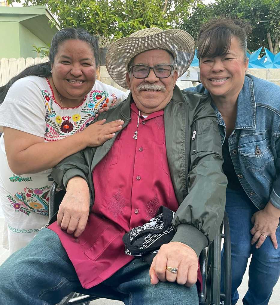Manuel Favala Rodriquez smiles with his daughters Veronica Yepez and Maricela Vallin