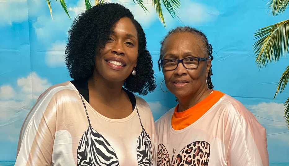 tonia smith and her mother joanne reeves pose for a photo at a beach themed party