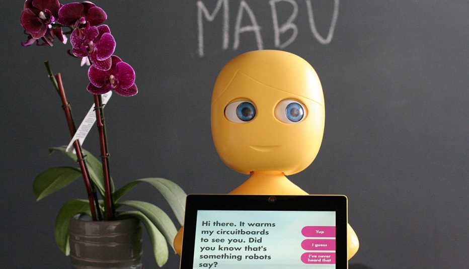 Mabu robot holding tablet