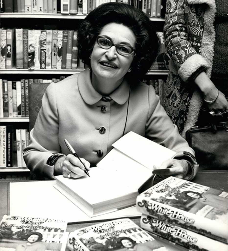 Lady Bird Johnson signing copies of her book