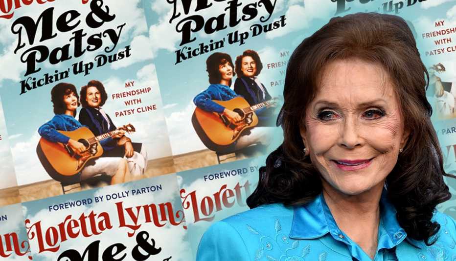  country music singer loretta lynn in front of an image of her new book cover