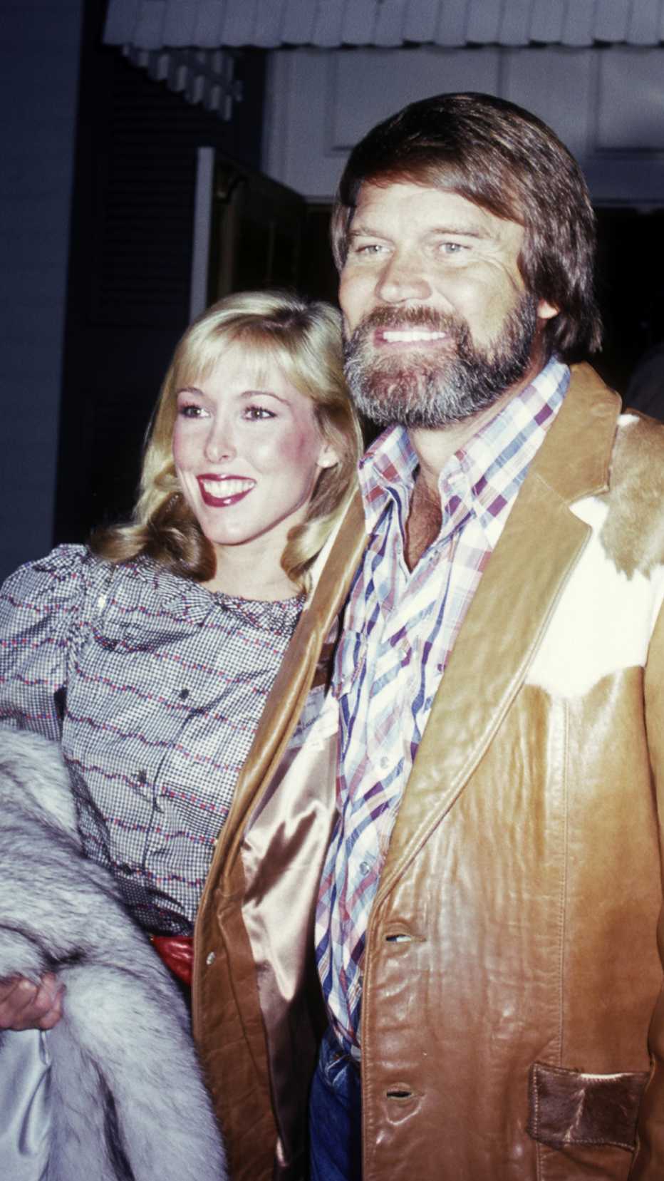Glen Campbell and Kim Woollen attend Pierre Cossette Super Bowl Party in 1982