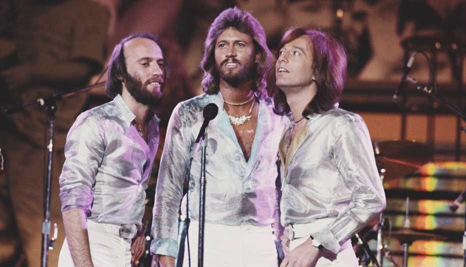 the bee gees performing at a unicef concert in nineteen seventy nine