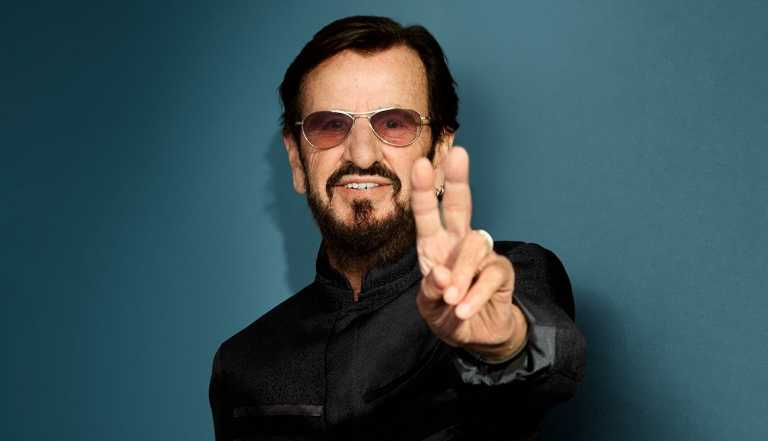 ringo starr making a peace sign