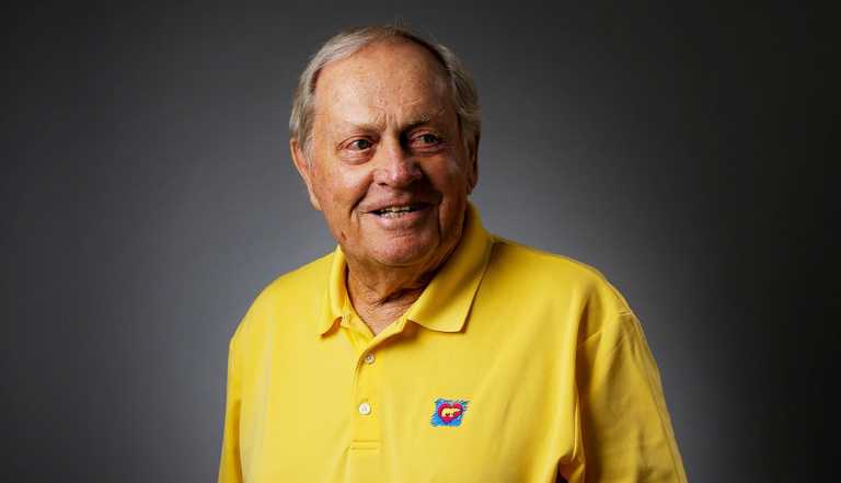 Jack Nicklaus in yellow shirt against gray background