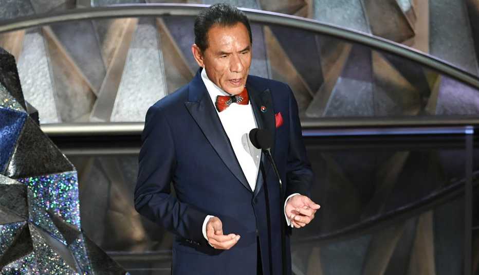 Actor Wes Studi speaks onstage during the 90th Annual Academy Awards