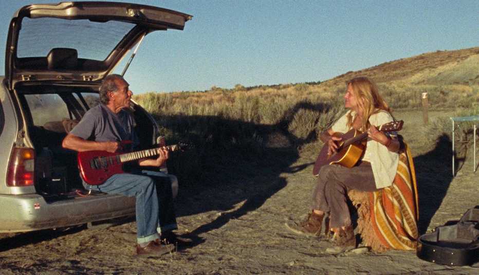 Wes Studi and Dale Dickey play their guitars with each other in the film A Love Song