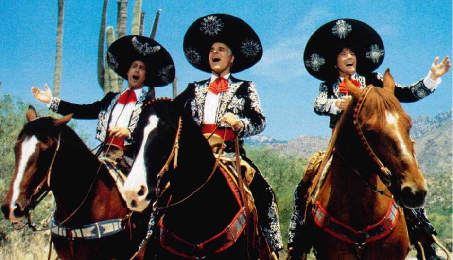Chevy Chase, Steve Martin and Martin Short riding horses
