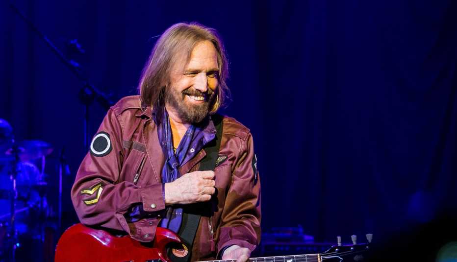Tom Petty and the Heartbreakers perform at DTE Energy Music Theater on August 24, 2014 in Clarkston, Michigan.