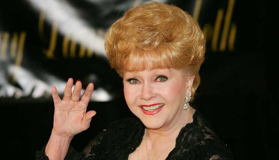 Actress Debbie Reynolds waves as she arrives for Dame Elizabeth Taylor's 75th birthday party at the Ritz-Carlton, Lake Las Vegas on February 27, 2007 in Henderson, Nevada.