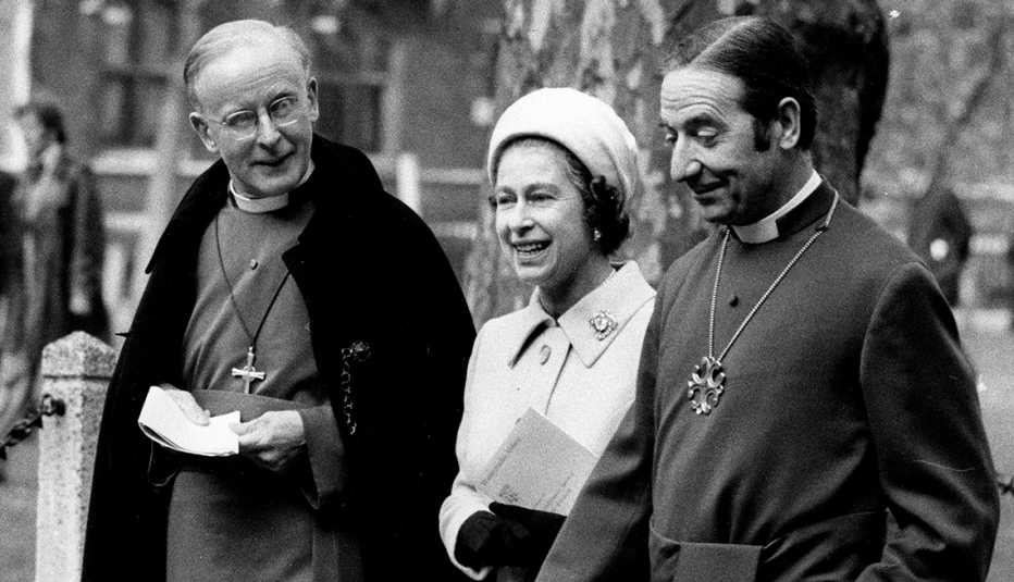 Queen Elizabeth II walking with Donald Coggan, Archbishop of Canterbury, and Stuart Blanche, Archbishop of York, from Westminster Abbey