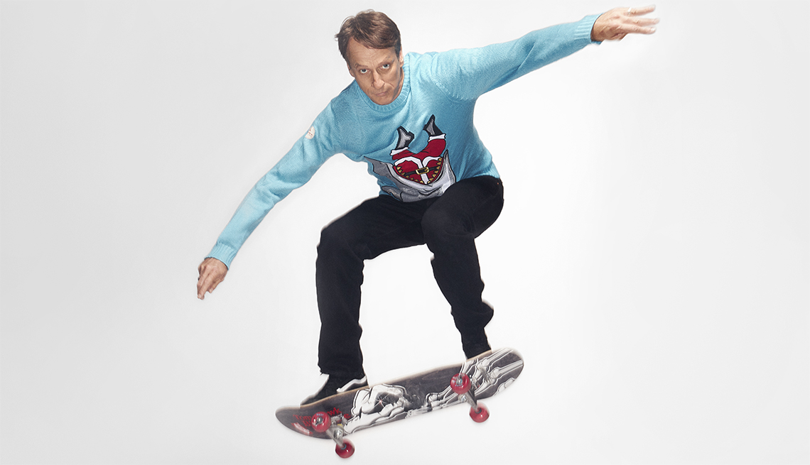 Tony Hawk performing a jump on a skateboard