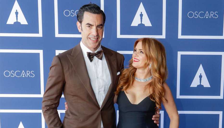 comedian and actor sacha baron cohen and isla fisher attending a screening of the oscars